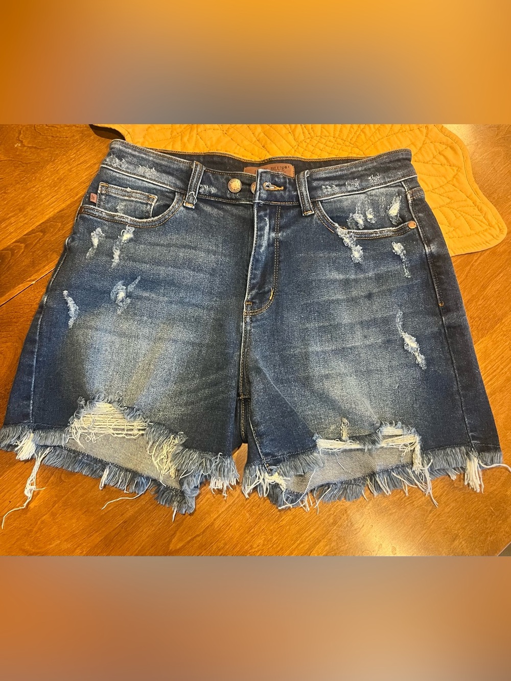 Judy Blue Women's Distressed Dark Blue Denim Shorts, size large.